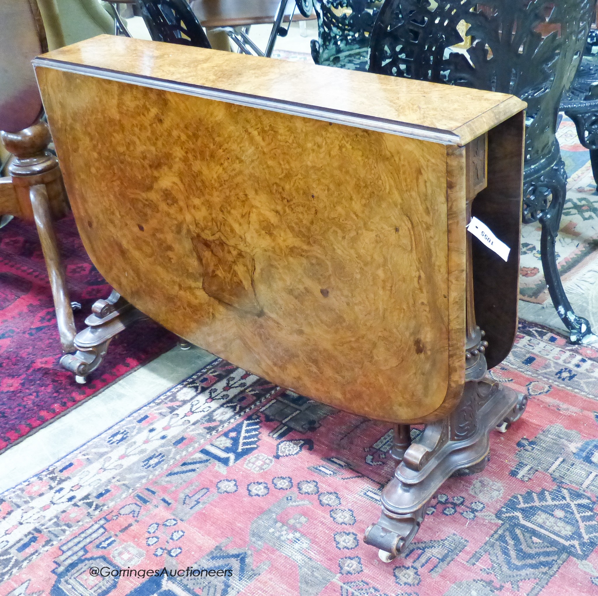 A Victorian burr walnut Sutherland table. 120cm extended, H-66cm.